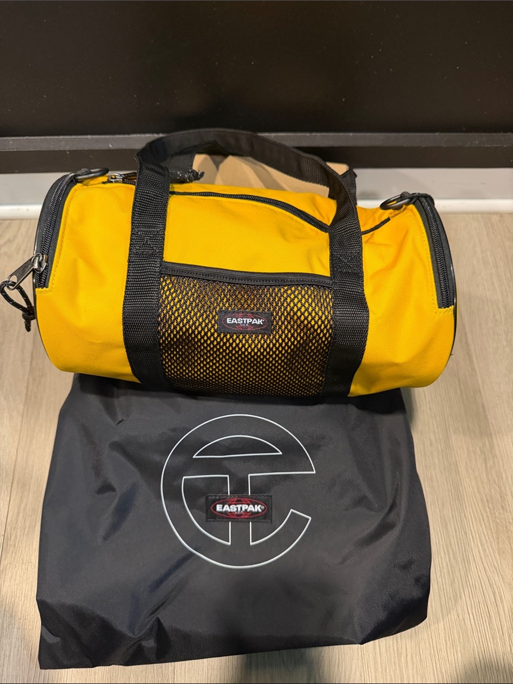 Eastpak Yellow Barrel Duffel with Black Webbing